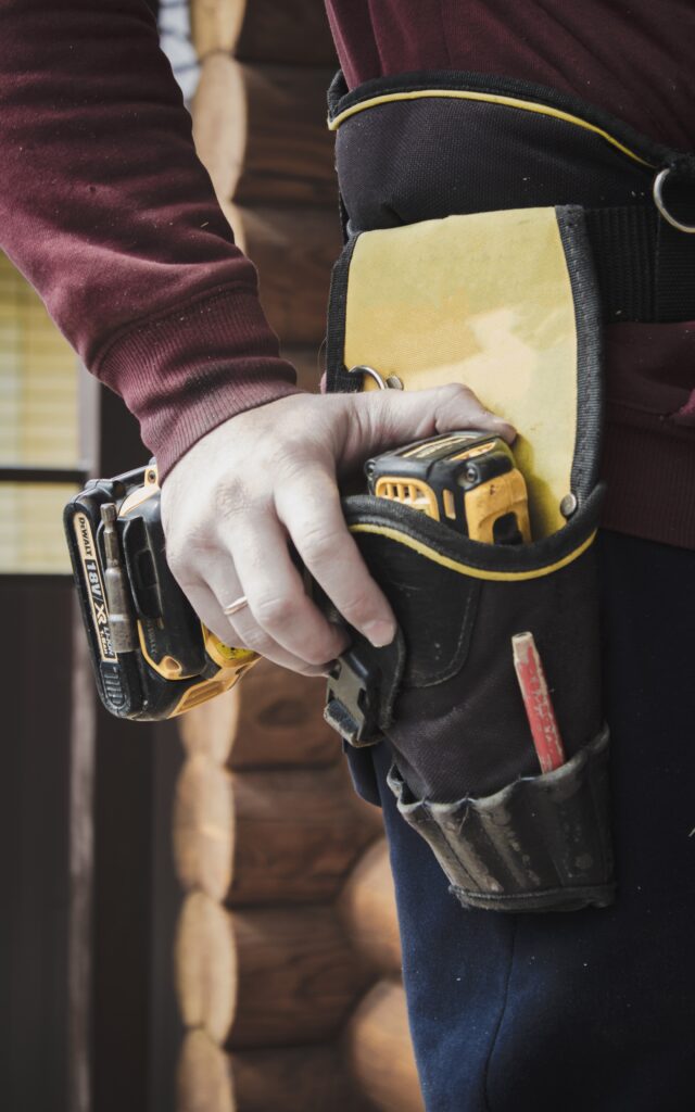 Commercial Electrician - man with tools in belt