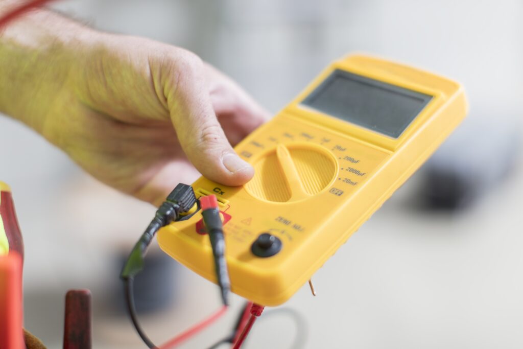 electrical services - close up of electrical tester